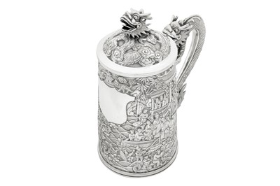 Lot 161 - A large late 19th century Chinese Export silver lidded mug or tankard, Canton circa 1880 by Qiu Ji, retailed by Lee Ching of Canton and later Hong Kong