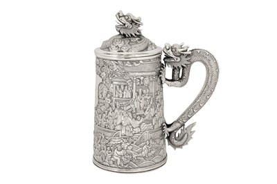 Lot 161 - A large late 19th century Chinese Export silver lidded mug or tankard, Canton circa 1880 by Qiu Ji, retailed by Lee Ching of Canton and later Hong Kong