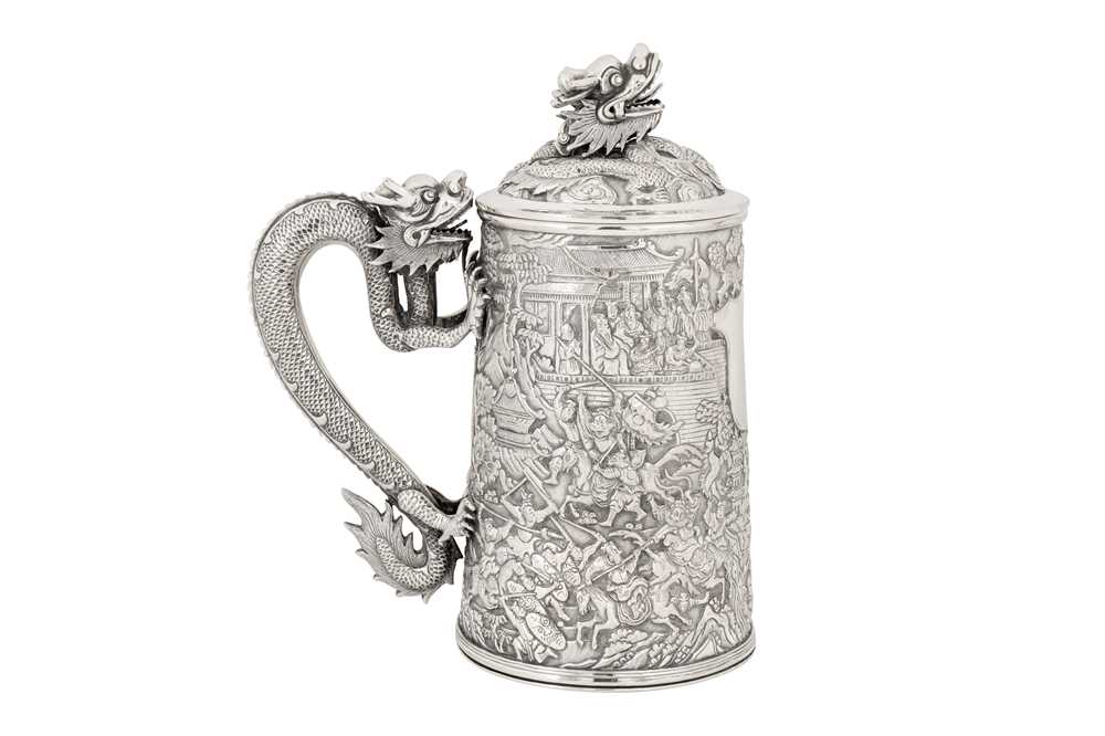 Lot 161 - A large late 19th century Chinese Export silver lidded mug or tankard, Canton circa 1880 by Qiu Ji, retailed by Lee Ching of Canton and later Hong Kong
