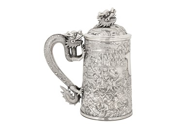 Lot 161 - A large late 19th century Chinese Export silver lidded mug or tankard, Canton circa 1880 by Qiu Ji, retailed by Lee Ching of Canton and later Hong Kong