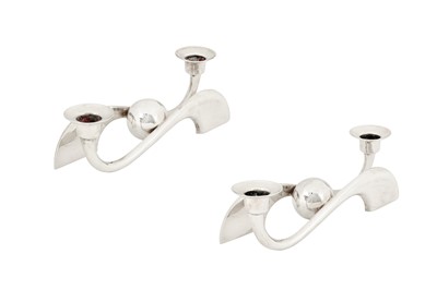 Lot 179 - A pair of mid-20th century Mexican modernist sterling silver low candlesticks, circa 1960