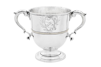 Lot 462 - A rare George II French plate brass twin handled cup, London circa 1750 by Anthony Christian (active c.1735-65)