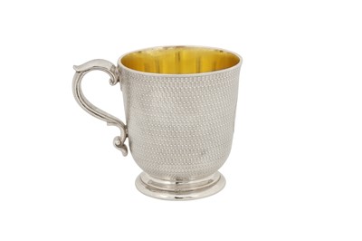 Lot 328 - A Victorian sterling silver gilt christening mug, London 1863 by Robert Garrard II (reg. 16th April 1818)