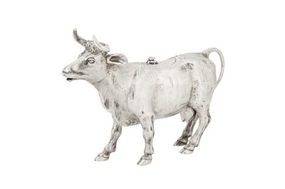 Lot 194 - A late 19th century German sterling silver cow creamer, import marks for Chester 1898 by Berthold Muller