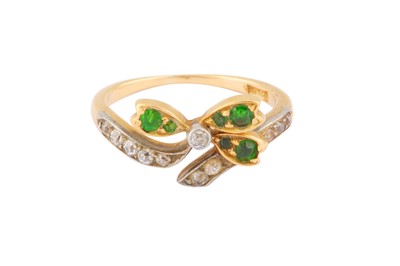 Lot 141 - A DEMANTOID GARNET AND DIAMOND RING