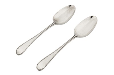 Lot 225 - A very rare pair of George III sterling silver tablespoons, London 1771 by Christopher Fly Woods and Thomas Filkin