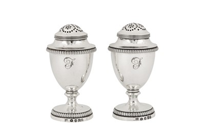 Lot 359 - A pair of George III sterling silver pepper casters, London 1809 by Rebecca Emes and Edward Barnard I