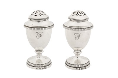Lot 384 - A pair of George III sterling silver pepper casters, London 1809 by Rebecca Emes and Edward Barnard I