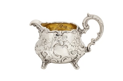 Lot 323 - A Victorian sterling silver milk jug London 1855 by William Smiley