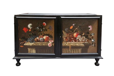 Lot 13 - A NORTH EUROPEAN PAINTED AND EBONISED TABLE CABINET