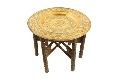 Lot 514 - AN INDIAN OCCASIONAL TABLE WITH A LARGE COPPER TRAY WITH THE ZODIAC SIGNS