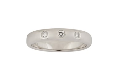 Lot 144 - A DIAMOND 'LUCIDA' BAND BY TIFFANY & CO.
