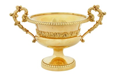 Lot 205 - A Louis Phillipe early 19th century French 950 standard silver gilt coupe à deux anses, Paris 1834-1838 by Etienne-Auguste Courtois (reg. 8th Jan 1834, biff. 11th Sep 1844)