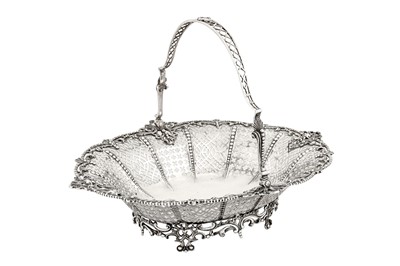 Lot 442 - An early George III sterling silver cake or bread basket, London 1760 by William Plumber (reg. 8th April 1755)