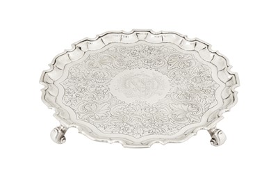 Lot 464 - A George II sterling silver salver, London 1735 by Denis Langton (this mark reg. 26th June 1732)