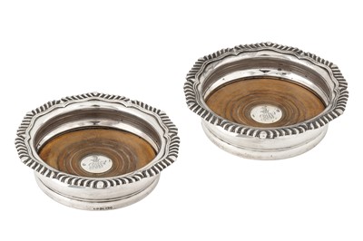 Lot 341 - A pair of Victorian sterling silver wine coasters, Sheffield 1865 by Creswick and Co