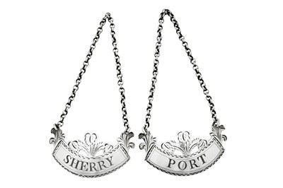 Lot 42 - A pair of George III sterling silver wine labels, London 1794 by Thomas Ollivant of Manchester overstriking Peter and Ann Bateman