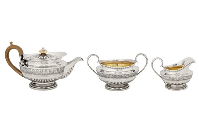Lot 372 - A George IV sterling silver three-piece tea service, London 1820/21 by Phillip Rundell (reg. 4th March 1819)