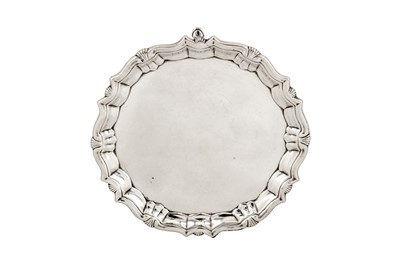 Lot 458 - A George II sterling silver coffee pot stand or waiter, London 1744 by Robert Abercromby (first mark alone reg. 5th Oct 1731)