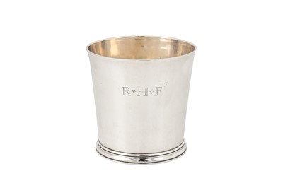 Lot 472 - A Queen Anne Britannia standard silver beaker, London 1704 by John East (reg. 23rd April 1697)
