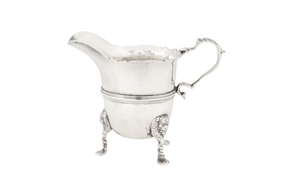 Lot 404 - A George II Irish sterling silver milk or cream jug, Dublin circa 1750 by Robert Glanville (active 1745-58)