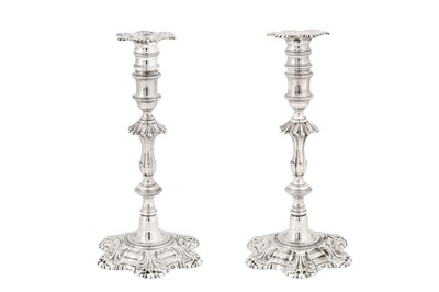 Lot 407 - A pair of early George III Irish sterling silver candlesticks, Dublin circa 1760 by James Warren (active 1752-89)