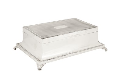 Lot 5 - A large George V sterling silver cigarette box, London 1935 by Edward Barnard and Sons