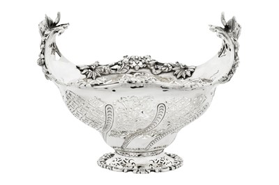 Lot 313 - An Edwardian sterling silver gilt basket, London 1903 by Lambert and Co overstriking another