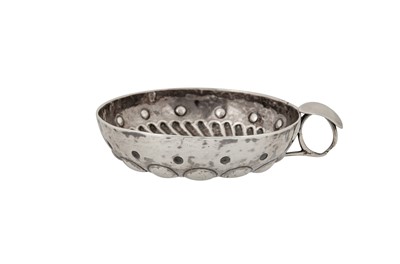 Lot 202 - A Louis XV French provincial silver wine taster, circa 1770