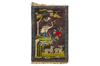 Lot 323 - A FINE TIBETAN RUG