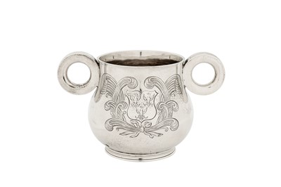Lot 294 - A George V sterling silver ‘Ox Eye’ or college twin handled cup, Chester 1925 by S Blanckensee and Son Ltd