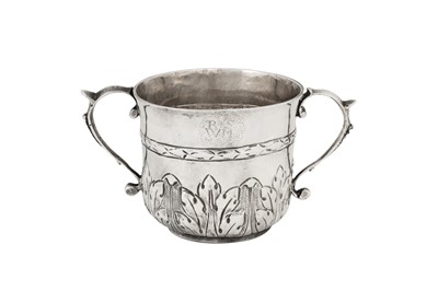 Lot 476 - A Chares II sterling silver twin handled porringer, London 1680 by Dorothy Grant (free. 1676, died c. 1712)