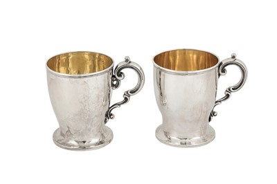 Lot 330 - A pair of Victorian sterling silver christening mugs, London 1848 by James Charles Edington