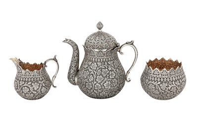 Lot 100 - A late 19th century Anglo - Indian silver three-piece tea service on tray, Kashmir circa 1890