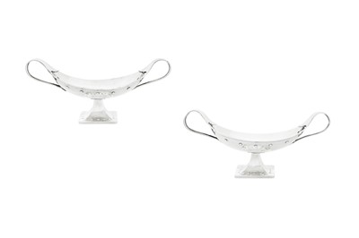 Lot 247 - A pair of George V ‘arts and crafts’ sterling silver twin handled dishes, Chester 1920 and Birmingham 1920 By A E Jones