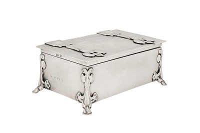 Lot 241 - A heavy Edwardian ‘arts and crafts’ sterling silver cigarette box, Birmingham 1901 by William Hutton and Sons