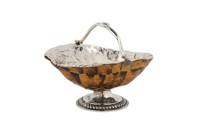 Lot 384 - A George II unmarked silver mounted tortoiseshell sugar basket, possibly Scottish circa 1750