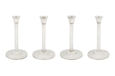 Lot 267 - A set of four Elizabeth II contemporary sterling silver candlesticks, London 2002 by Theo Fennell