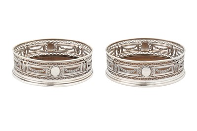 Lot 204 - A pair of late 19th century French 950 standard silver wine coasters, Paris circa 1890 by Alfred Hector (active 1881-1913)