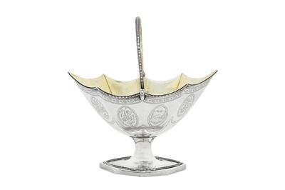 Lot 428 - A George III sterling silver sugar basket, London 1787 by Benjamin Montague