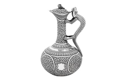 Lot 116 - An early 20th century Anglo – Indian silver claret jug or ewer, Cutch circa 1910