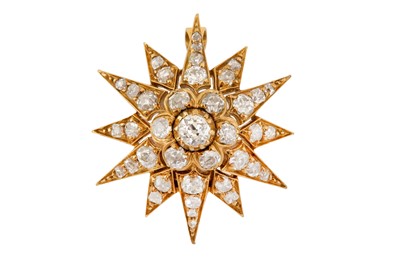 Lot 82 - A DIAMOND STAR PENDANT