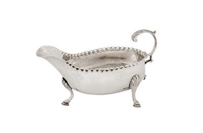 Lot 452 - A George III sterling silver cream boat, London 1775 by IS and AN (unidentified)