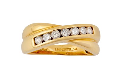 Lot 49 - A DIAMOND CROSSOVER RING, CIRCA 1995