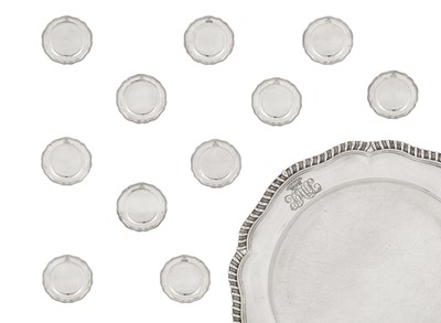 Lot 375 - Marchioness of Londonderry – A set of twelve George IV sterling silver dinner plates, London 1828 by Benjamin Smith III