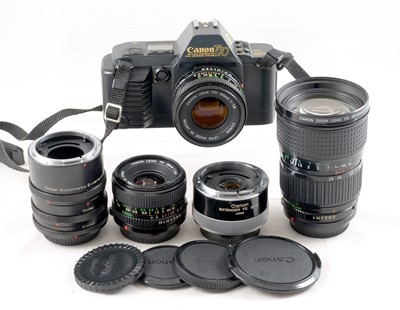 Lot 184 - Three-Lens Canon T70 Film Camera Outfit.