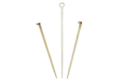 Lot 232 - A pair of George III sterling silver gilt poultry skewers, London 1806 by William Eley and William Fearn