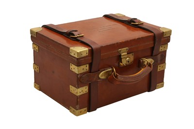 Lot 404 - A BOSS AND CO BRASS-BOUND LEATHER CARTRIDGE MAGAZINE