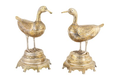 Lot 397 - A PAIR OF ENGRAVED AND OPENWORK SILVERED BRASS INCENSE BURNERS IN THE SHAPE OF DUCKS