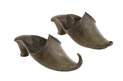 Lot 398 - A PAIR OF DECORATIVE QAJAR METAL SLIPPERS